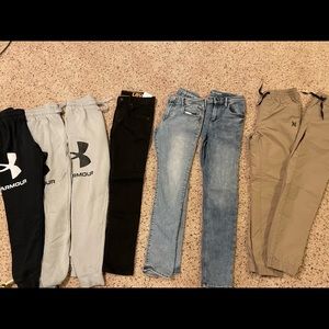 Sz 14 gap jeans Size 12 reg Levi. 3 YLg under armour sweats. 2 size L Hurley jog